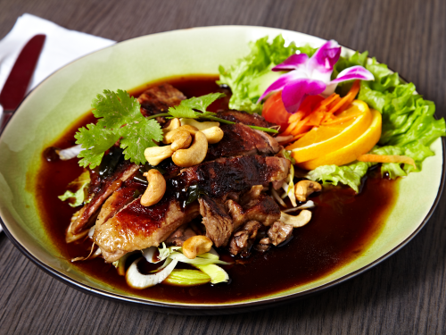 Grilled lacquered duck with honey and soy