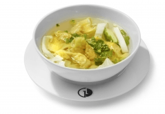 Ravioli soup with scampis