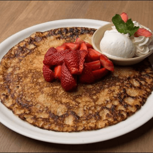 Pannekoek aardbeien en slagroom