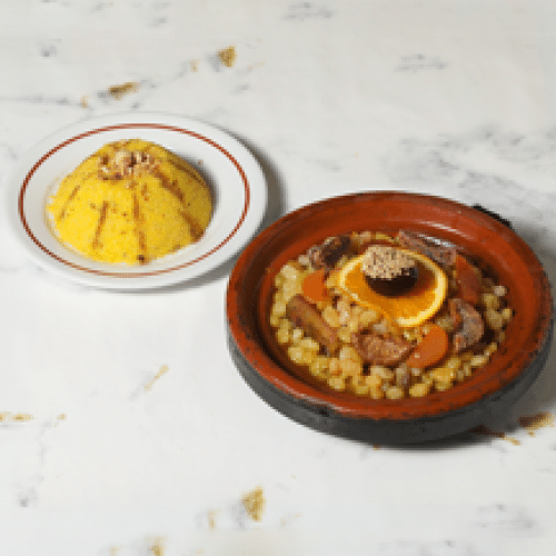 Tajine d'agneau aux raisins blonds confits et oignons