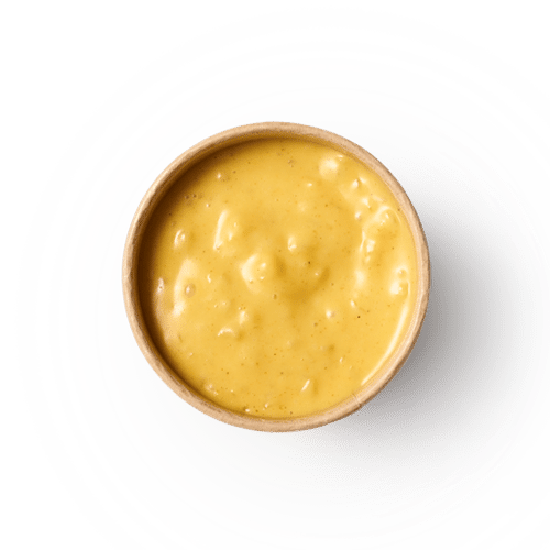 Joppiesaus cup, a seasoned sauce with curry and onion flavor