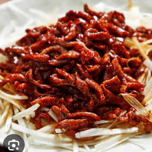 geraspte varkensvlees met peking saus