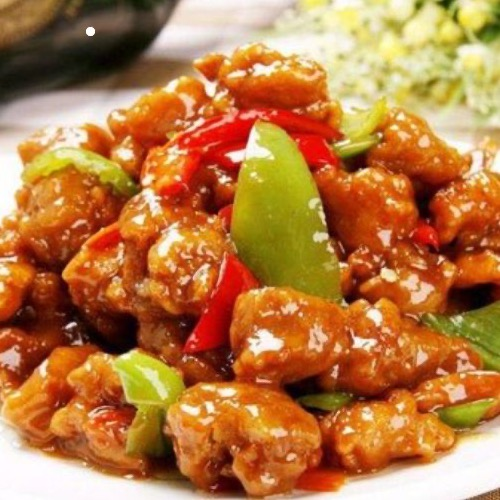 Krokante varkensbites in glanzende saus