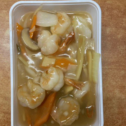 Scampis sautées aux légumes de saison