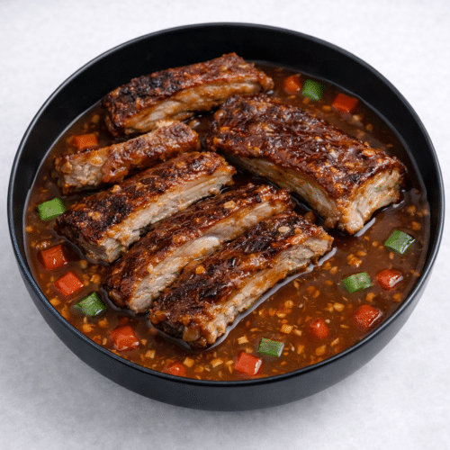 Varkensribbetjes in Kung Pao saus