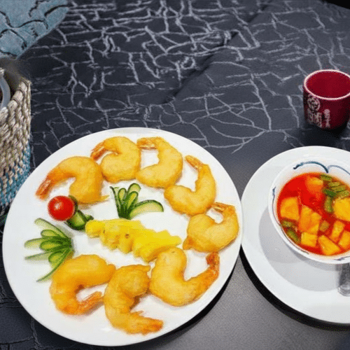 Beignets de scampis à la sauce aigre-douce aux ananas