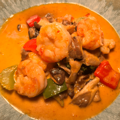 Scampis au curry rouge et lait de coco