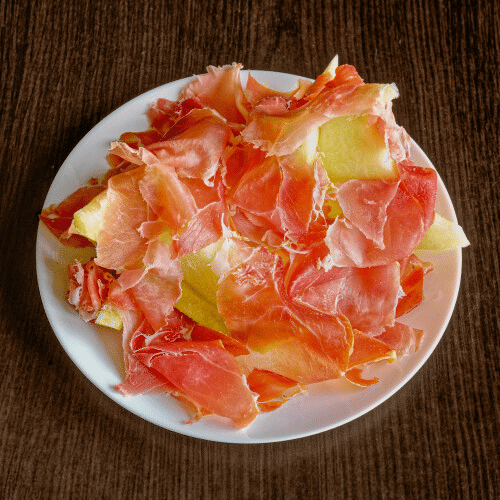 Jambon de Parme et fruit de saison