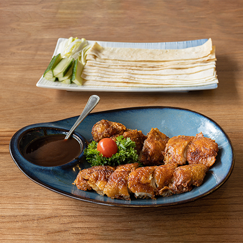Peking roast duck with homemade thin pancakes