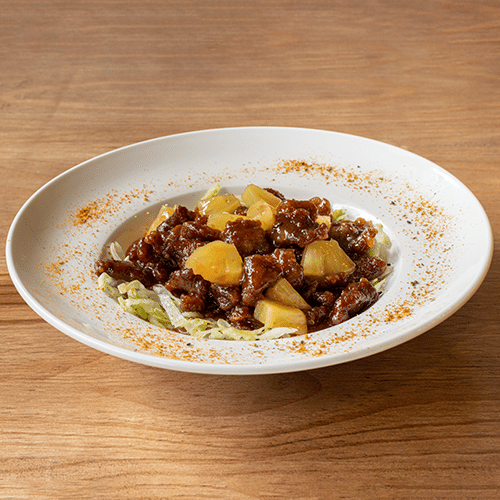 Caramelized beef with diced pineapple