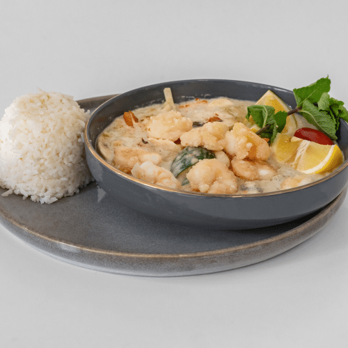 Scampis au curry vert et lait de coco