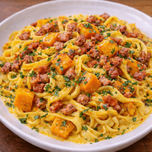 Tagliatelle de potimarron, crème curry et lardons