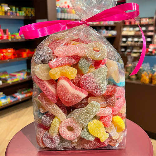 Snoepzak (1 kg) zuur-gesuikerde snoepmix (bevat gelatine)