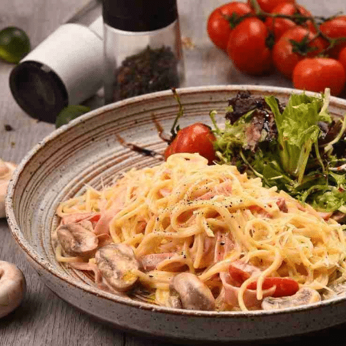 Spaghetti prosciutto funghi