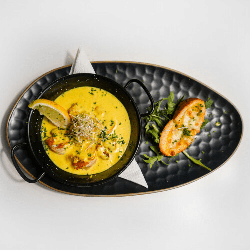 Scampi's in currysaus