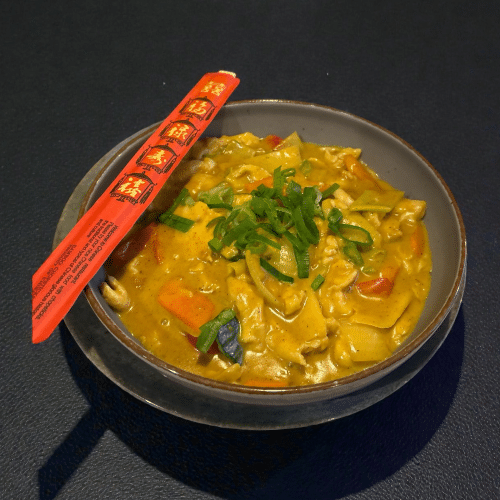 27. kip met diverse groenten in currysaus