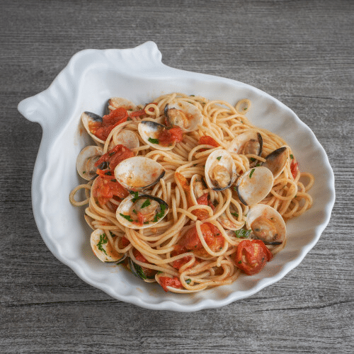 spaghetti vongole met kerstomaatjes