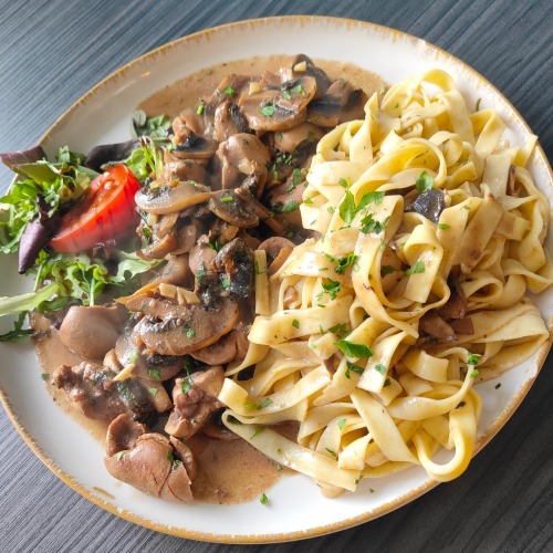 Kalfsnieren met gegrilde champignons