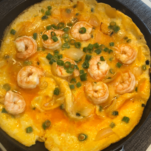 Chinese omelet met scampi