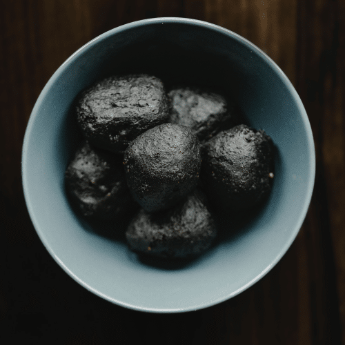 Black cheesy balls