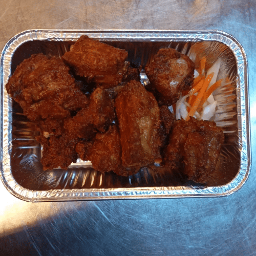 Varkenribbekens met zoetzure saus