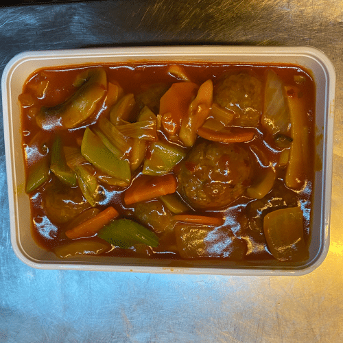 Varkensballetjes in tomatensaus