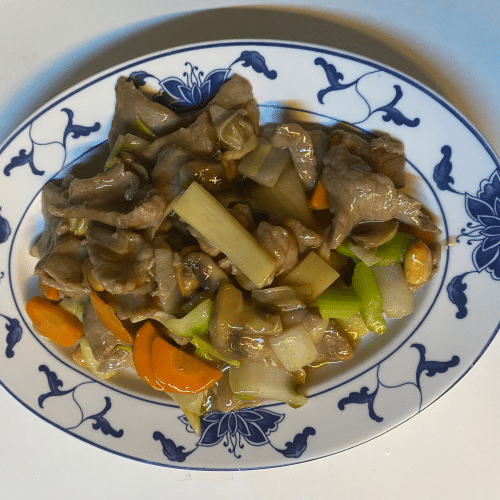 Varkenslapjes met groenten en amandelen