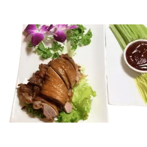 Canard laqué avec crêpes