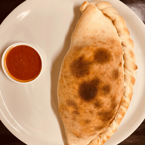 Pizza Calzone vegetarisch (zugedeckt)