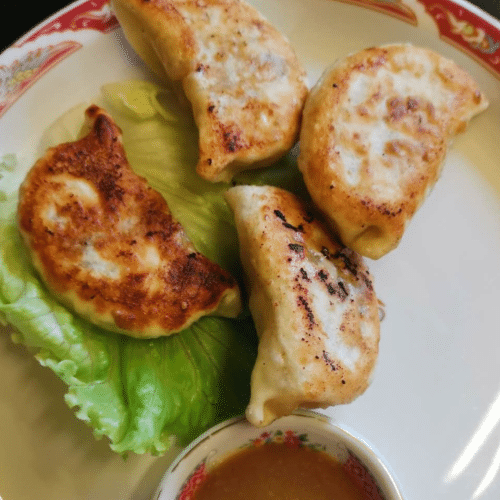 Raviolis grillés au porc (4 pièces) 锅贴