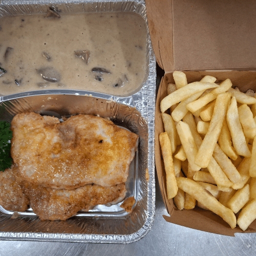 Schweinsschnitzel an Champignonrahmsauce