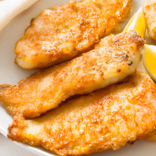 Alaska-Seelach in Knusperbackteig mit Pommes Frites