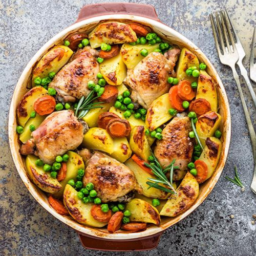 Poulet-Voressen mit Pommes Frites und Gemüse