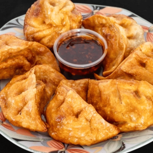 Fritierte Poulet Momos (12 Stück)