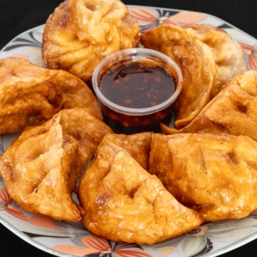 Fritierte Poulet Momos (20 Stück)