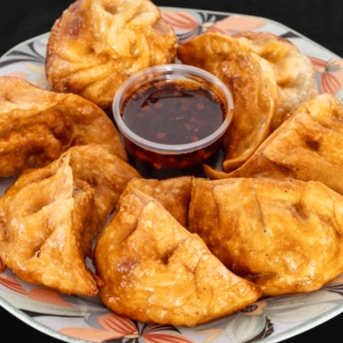 Fritierte Poulet Momos (5 Stück)