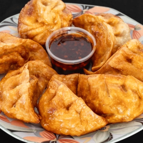 Fritierte Poulet Momos (8 Stück)