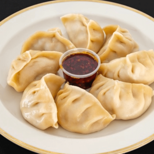 Poulet Momos (12 Stück)