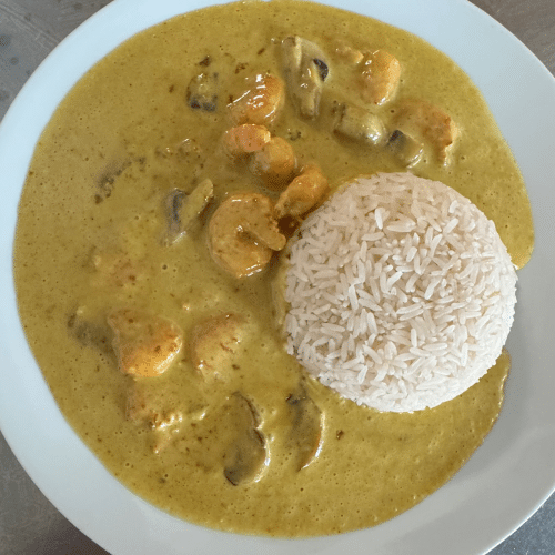 Riesencrevetten an gelber Currysauce