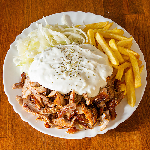 Gyros platter with French fries, salad and tzatziki