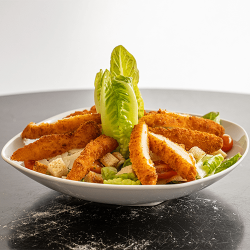 Caesar salad with chicken breast