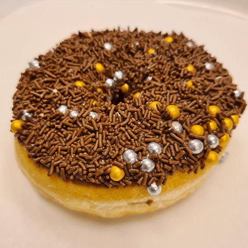Milk chocolate sprinkles and flakes luxury donut