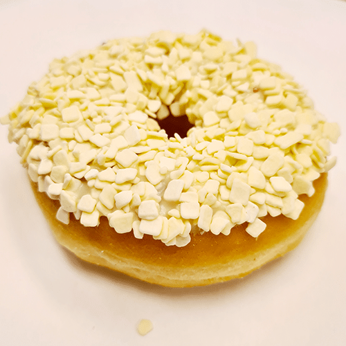 White chocolate sprinkles and flakes luxury donut