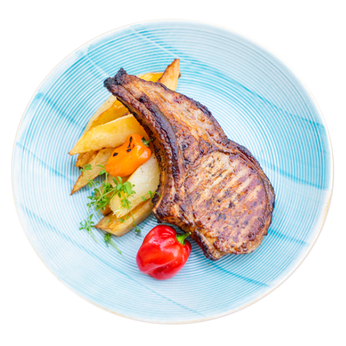 Pork chop marinated in beer with fries